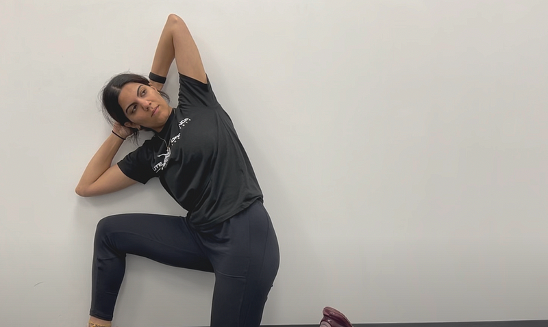 Wall-Assisted Thoracic Rotations exercise demonstration