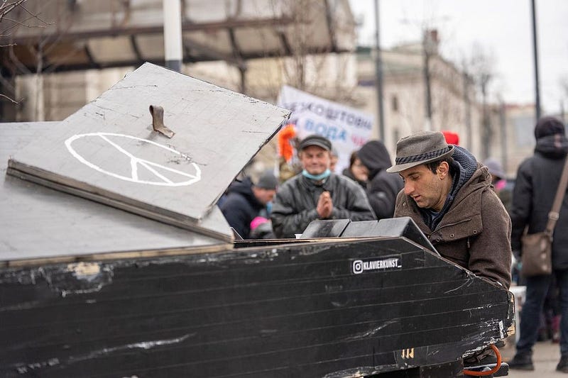 Davide Martello playing piano in Lviv